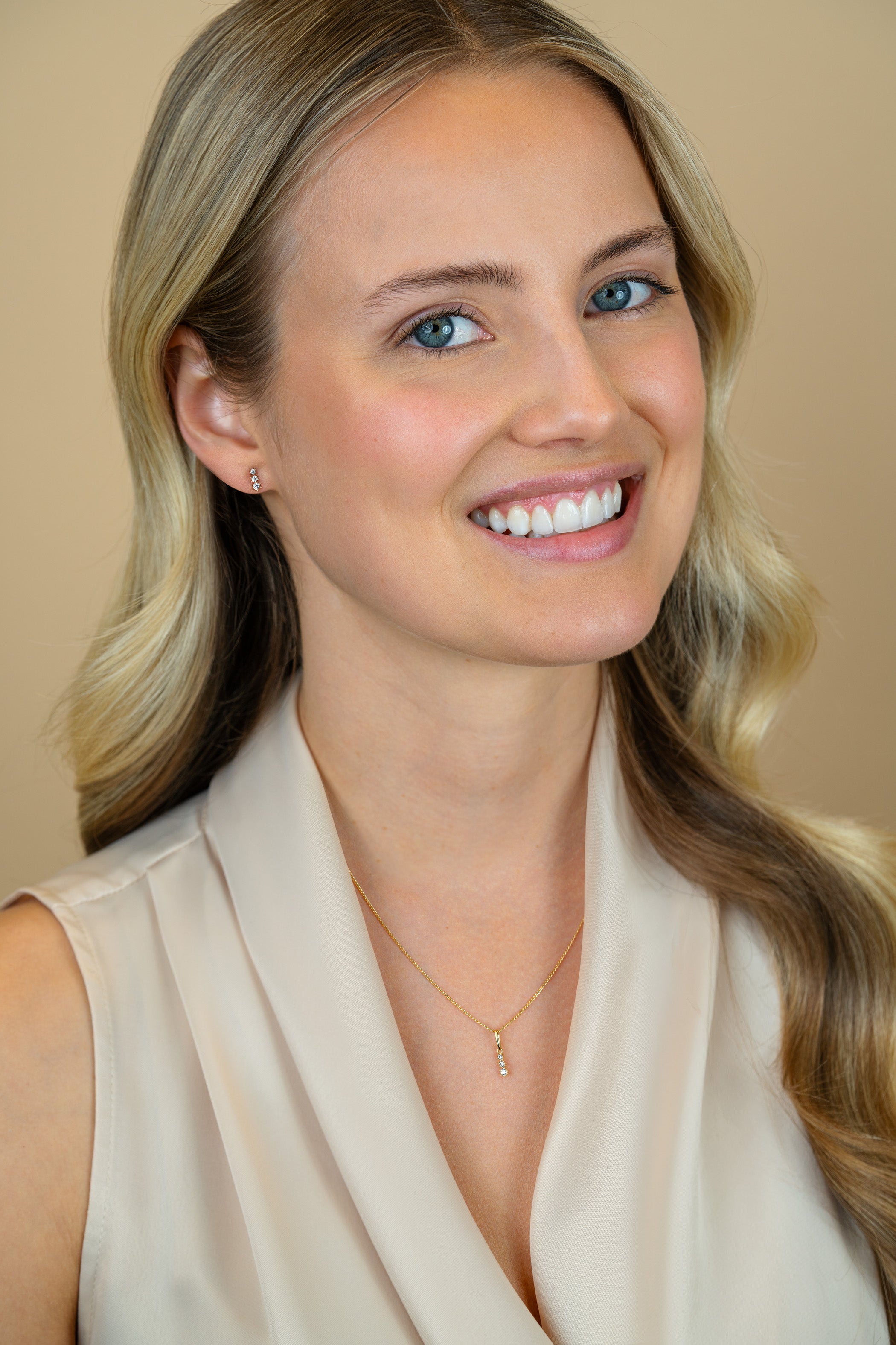 6,5mm ZINZI Gold 14 krt gouden oorstekers bezet met een rij aan witte zirkonia's ZGO543