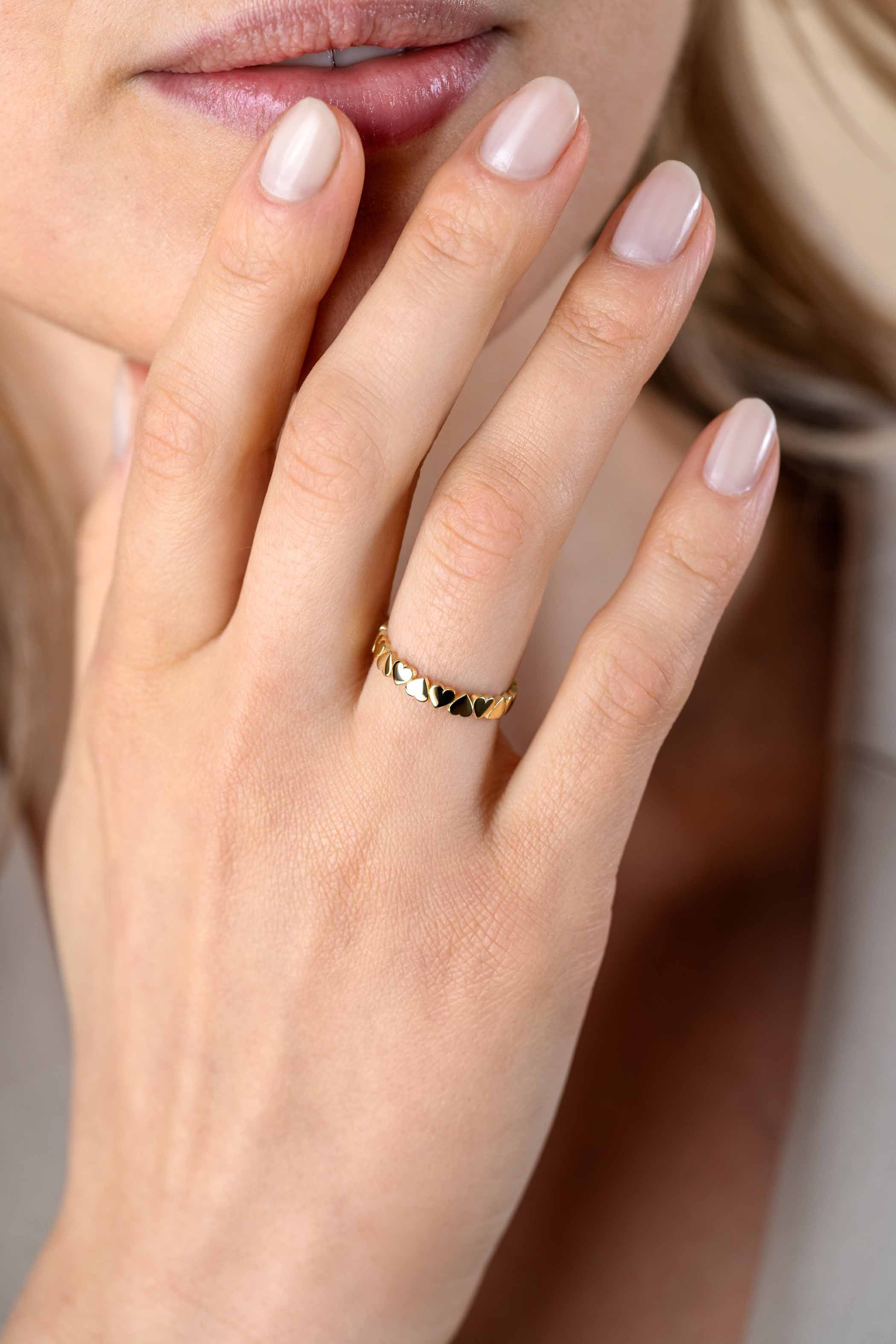 ZINZI Gold 14 krt gouden aanschuifring met gladde hartjes rondom (3mm) ZGR447