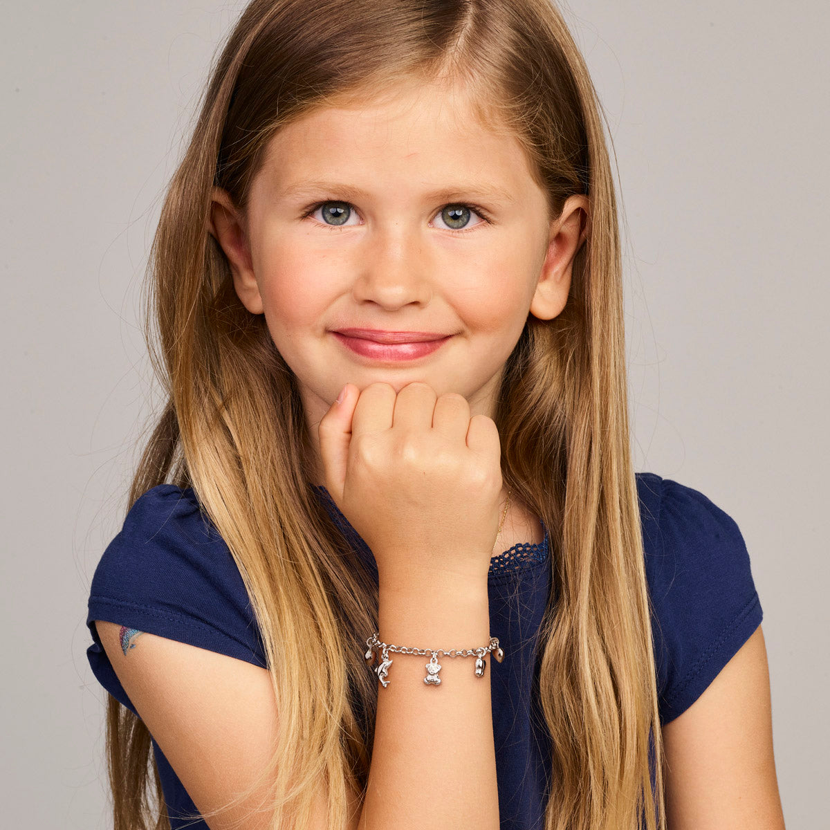 Zilveren armband met 5 diverse bedels  | 15cm