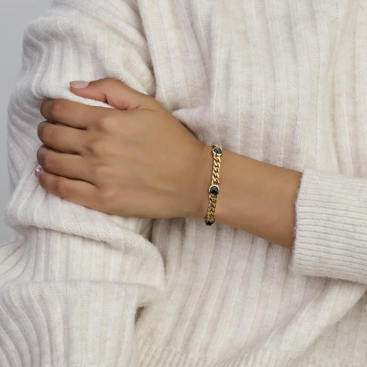 14krt geelgouden "maxima" armband met zwarte onyx 7,5mm  | 19cm