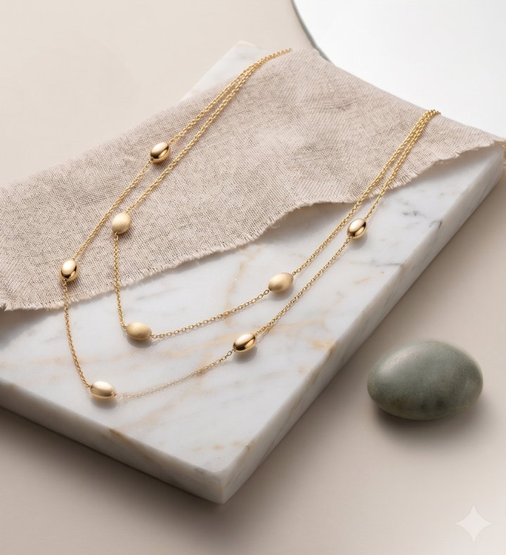 Monzario - 14krt geelgouden collier met 5x8mm bollen mat/poli | 45cm