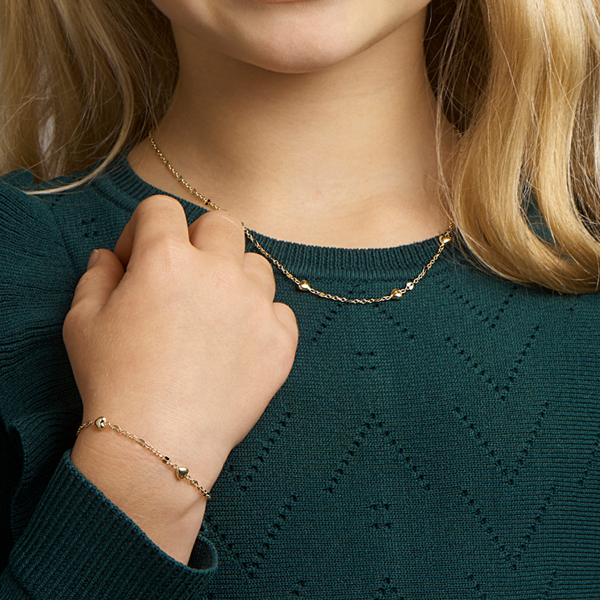 14krt geelgouden armband kind met 3 hartjes | 11-13cm